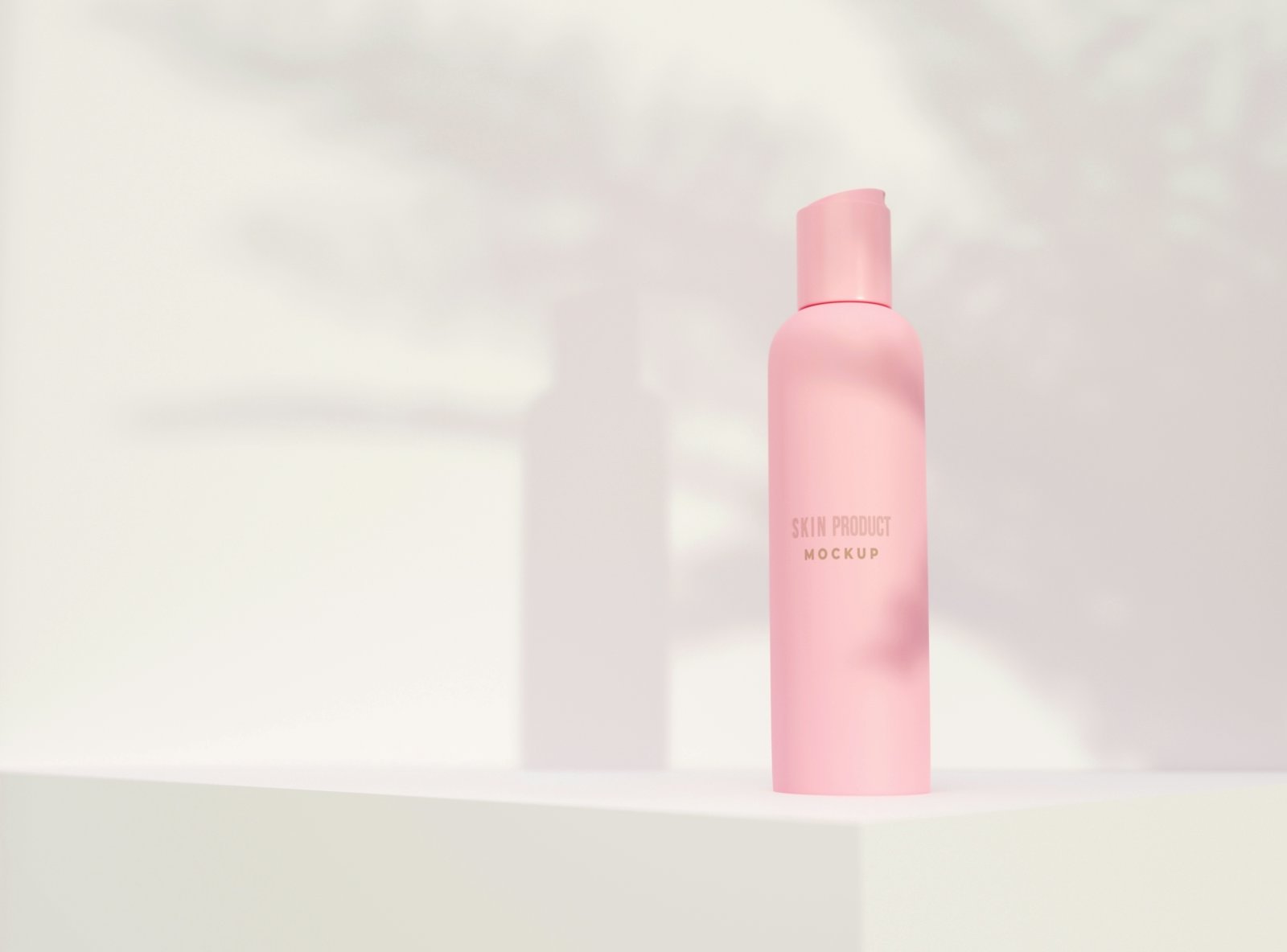 A pink facial mist bottle